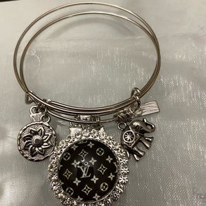 Pair of charmed brackets-adjustable